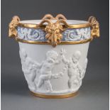 Sevres-Style Gilt, Bisque and Glazed Porcelain Cachepot , with ram's heads and Classical frieze,
