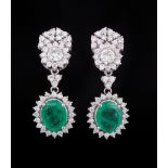 Pair of 18 kt. White Gold, Emerald and Diamond Dangle Earrings , fan shaped upper segment