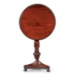 Fine Anglo-Colonial Carved Rosewood Tilt-Top Table , 19th c., circular top with egg and dart
