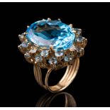 14 kt. Yellow Gold, Blue Topaz and Diamond Ring , large oval center stone surrounded by smaller