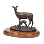 Bronze Figural Group of a Doe and Fawn on a Riverbank , indistinctly signed and dated "06" on self