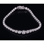 18 kt. White Gold and Diamond Bracelet , comprised of 42 round brilliant cut diamonds, total wt.