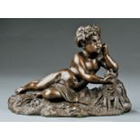 French Bronze Allegorical Figure of a Reclining Putto , mid-19th c., seraphic young male leaning