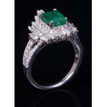 Platinum, Emerald and Diamond Ring , center prong set rectangular cut cornered step cut emerald, wt.
