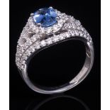 Platinum, Sapphire and Diamond Ring , center prong set oval mixed cut sapphire, wt. 1.51 cts., 8.