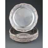 Ten Chippendale-Style Silverplate Chargers , serpentine gadrooned borders, marked "ROYAL CASTLE/
