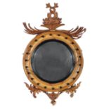 Georgian-Style Carved Pine Bullseye Mirror , surmounted by entwined dolphins and foliage, cavetto