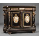 Napoleon III Ebonized Bronze-Mounted Cabinet , c. 1875, shaped molded top, conforming case, frieze