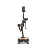 Art Nouveau Bronze Figural Lamp , cast as a female nude holding a lotus flower aloft, footed