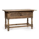 Spanish Carved Fruitwood Refectory Table , 19th c., three board top, single foliate carved drawer,