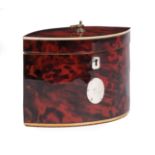 George III Red Tortoiseshell Tea Caddy , 19th c., lens form, void cartouche, interior with lidded