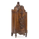 French Provincial Carved Walnut Candlebox , sliding cover, with relief of musical trophee, h. 16 1/2