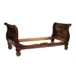 Italian Rococo-Style Carved Fruitwood Daybed , out scrolled headboard and foot board, serpentine