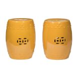 Pair of Yellow Chinese Garden Seats , barrel form, pierced decoration, h. 17 1/2 in., dia. 13 in