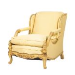 Continental Rococo-Style Carved and Painted Armchair , mid-20th c., wing-back, dolphin figural arms,