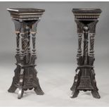 Pair of Eastlake Carved, Ebonized and Parcel Gilt Pedestals , c. 1875, stepped tops, flared