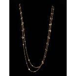 18 kt. Yellow Gold and Diamond Station Necklace , cable chain spaced with 68 bezel set round