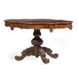 American Rococo Carved Rosewood Center Table , mid-19th c., molded turtle top, floral and scroll