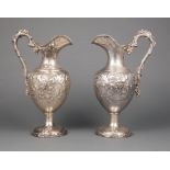 Rare Pair of American Sterling Silver Repousse Ewers , Peter L. Krider & Co., Philadelphia, act.