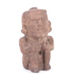 Pre-Columbian Carved Stone Effigy Figure , 1300-1519 A.D., Aztec, modeled with bared teeth, ear