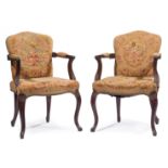 Pair of Louis XV-Style Carved Mahogany Fauteuils , padded back, arms and seat, cabriole legs, h.