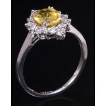 Platinum, Yellow Sapphire and Diamond Ring , center prong set oval cut yellow sapphire, wt. approx.