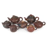 Seven Chinese Yixing Pottery Teapots , 20th c., variously marked, some inscribed, h. 2 1/2 in. to