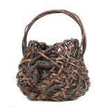 Japanese Rootwood Embellished Woven Bamboo Ikebana Basket , h. 13 1/2 in . Provenance: Acquired