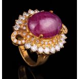 18 kt. Yellow Gold, Cabochon Ruby and Diamond Cluster Ring , set with oval cabochon ruby, approx.