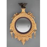 Regency Carved Giltwood Girandole Mirror , early 19th c., spread-wing eagle crest, spherule-