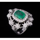 18 kt. White Gold, Emerald and Diamond Ring , center prong set cushion shape brilliant cut