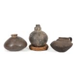 Three Pre-Columbian Blackware Vessels , 1000-1300 A.D., incl. jug with face spout, Columbia, h. 6