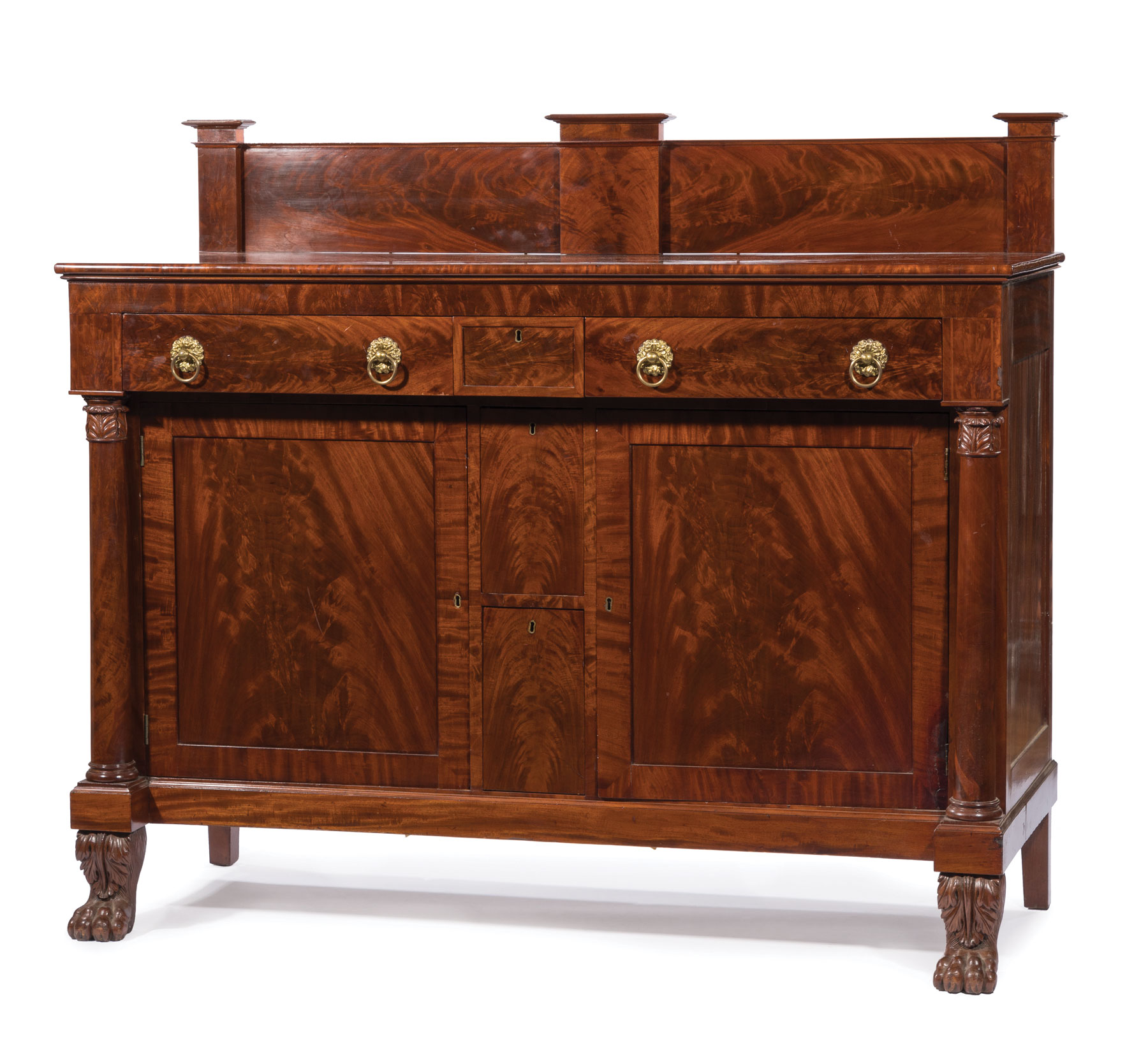American Classical Carved Mahogany Sideboard , early 19th c., New York, blocked backsplash, outset