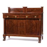 American Classical Carved Mahogany Sideboard , early 19th c., New York, blocked backsplash, outset