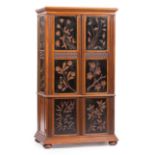 American Aesthetic Ebonized, Carved and Parcel Gilt Walnut Cabinet , late 19th c., in the manner