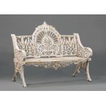 Pair of American Cast Iron "Peacock" Pattern Garden Benches , 19th c., after the design by