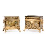 Two Brass-Mounted Bohemian Enameled Amber Glass Dresser Boxes , 20th c., hinged lids, scroll and