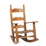 Louisiana Hickory Child's Rocking Chair , 19th c., ring-incised stiles with finials, slat back,