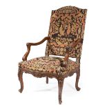 Regence-Style Carved Walnut Fauteuil a la Reine , needlepoint padded back and seat, scrolled arms,
