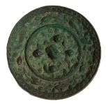 Chinese Bronze Mirror , probably Tang Dynasty (618-906), central zoomorphic knop encircled by six
