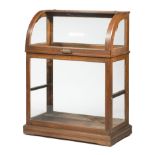 American Oak Walking Cane Display Case , labeled "Oscar Oken & Co., Cincinatti", domed top, glazed