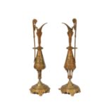 Pair of French Bronze Ewers , c. 1900, cast with Bacchic decoration, centered with reliefs of