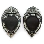 Pair of Venetian Beveled and Engraved Glass Mirrors , shield shaped, segmented surround with foliate