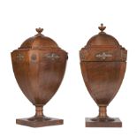 Pair of Regency-Style Mahogany Cutlery Urns , telescoping lids with urn finials, retain fitted
