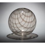 Lino Tagliapietra (Italian, b. 1934) Glass "Filligrana Sphere" , 1995, clear with brown canes in "
