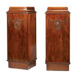 Pair of Antique Adam-Style Carved Mahogany Pedestal Cabinets , cove molded tops, gadrooned