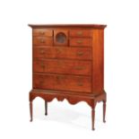 American Carved Cherrywood Chest-on-Stand , late 18th/early 19th c., case with molded top, center