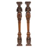 Pair of Continental Carved Walnut Figural Pilasters , 19th c., Ionic capital over female warrior