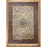 Persian Isfahan Carpet , central ivory ground, central medallion, overall vining floral design, 9