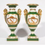 Pair of Sevres-Style Porcelain "Napoleonic" Urns , 19th c., female bust handles, reserves with